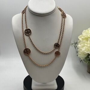 Michael Kors MKJ4479710
Open Monogram Disc Station
Necklace‎